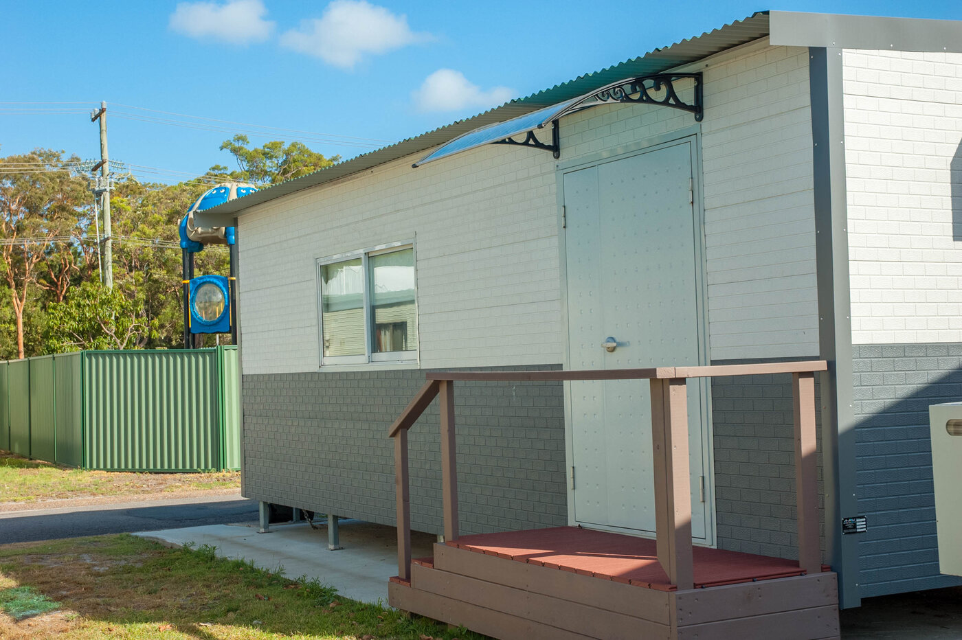Exterior of a Bellhaven villa with covered entry